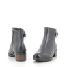 Boots noires avec boucle dorée